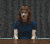 a man and a woman are sitting at a table