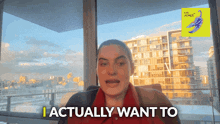 a woman says " i actually want to " in front of a window