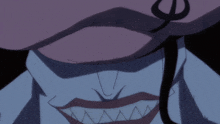 a close up of a person 's face with a hat on