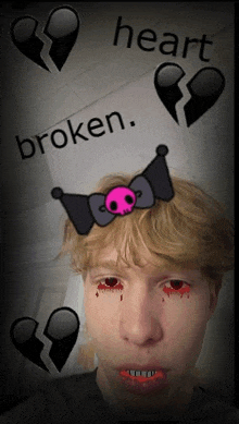 a man with broken hearts on his head