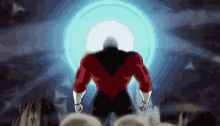 a man in a red and black suit is standing in front of a blue ball .
