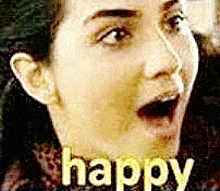 a close up of a woman 's face with the word happy written on her face