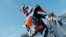 a knight with a sword and shield is standing in the air