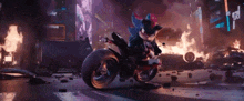 shadow the hedgehog is riding a motorcycle on a city street in a video game .