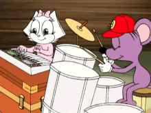 baby kitty mookie baby felix drumsticks playing drums