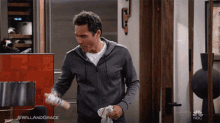 Cleaning Eric Mccormack GIF - Cleaning Eric Mccormack Will Truman GIFs