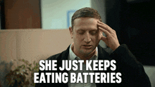 She Just Keeps Eating Batteries I Think You Should Leave With Tim Robinson GIF - She Just Keeps Eating Batteries I Think You Should Leave With Tim Robinson She Just Keeps Munching Batteries GIFs