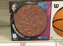 a box for an angel reese outdoor basketball sits on a store shelf