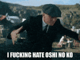 a man in a suit and hat is dancing with the words i fucking hate oshi no ko below him