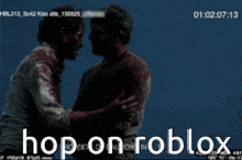 two men hugging with the words hop on roblox in the corner