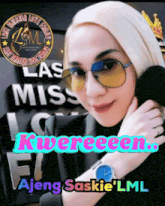 a woman wearing sunglasses stands in front of a sign which says las miss