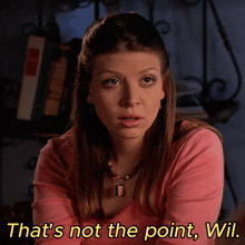 a woman in a pink shirt says " that 's not the point will "