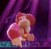 donkey kong is dancing on a stage in a video game while wearing a red tie .