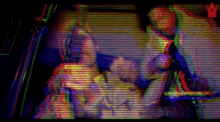 a blurry picture of a man and a woman with the words nvidia on the bottom left