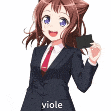 a girl in a suit and tie holding a card that says viole on it