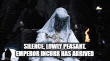 a man in a white robe is sitting in a chair with the words silence lowly peasant