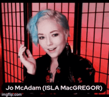 a picture of a woman with blue hair named jo mcadam