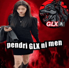 a woman in a black dress is standing in front of a wolf logo that says glx