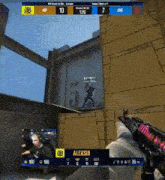 a man is holding a gun in front of a screen that says alexsib