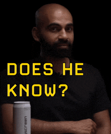 a man sitting at a table with the words " does he know " written above him