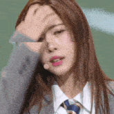 a close up of a woman 's face with kbs written on the bottom