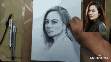 a drawing of a woman with the words made in animatica below it