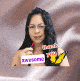a woman with glasses is holding a pen and a sticker that says awesome and thank you