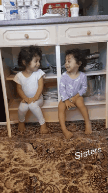 twin sisters toddlers twin kiss cute