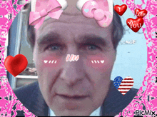 a man 's face is surrounded by pink hearts and says i love you junge