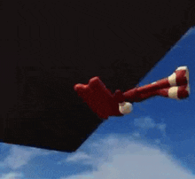 sonic the hedgehog is flying through the air with his arms outstretched and his legs crossed .