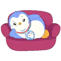 a penguin is laying on a red couch with a smaller penguin