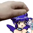 a hand is touching a cartoon character 's head
