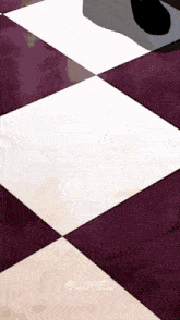 a purple and white checkered floor with the hashtag @limeu on the bottom