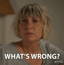 a woman with a surprised look on her face says what 's wrong netflix