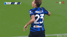 a soccer player with the number 9 on his jersey celebrates a goal