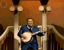 Roy Clark Banjo GIF - Roy Clark Banjo Playing Music GIFs