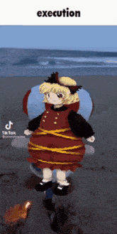a girl in a red dress is standing on a beach next to a flame and the words execution above her