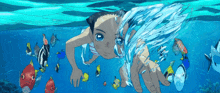 a girl in a bikini is swimming in the ocean with fish