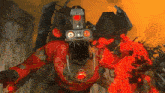 a red monster with a clock on his head is surrounded by red flames