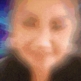 a colorful painting of a woman 's face with a black background