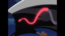 a person is holding a sword with a red swirl on it