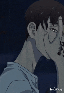a drawing of a man with a tattoo on his hand and the words imgplay on the bottom right