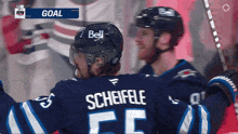 a hockey player with the name scheifel on his jersey