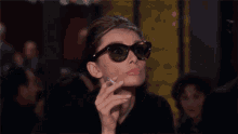 Audrey Hepburn Cigar GIF