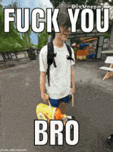 a man with a backpack is holding a spongebob balloon that says fuck you bro