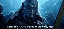 a man with long hair and a sword says looks like suicide is back on the menu boys