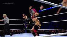 a woman in a wrestling ring with the words hop on tekken