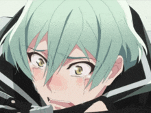 a close up of a person with green hair