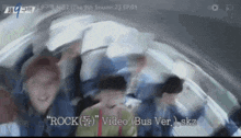 a group of people are sitting in a car with the words rock video bus ver .. skz