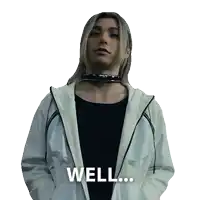 a man wearing a choker and a white jacket with the words well written on it
